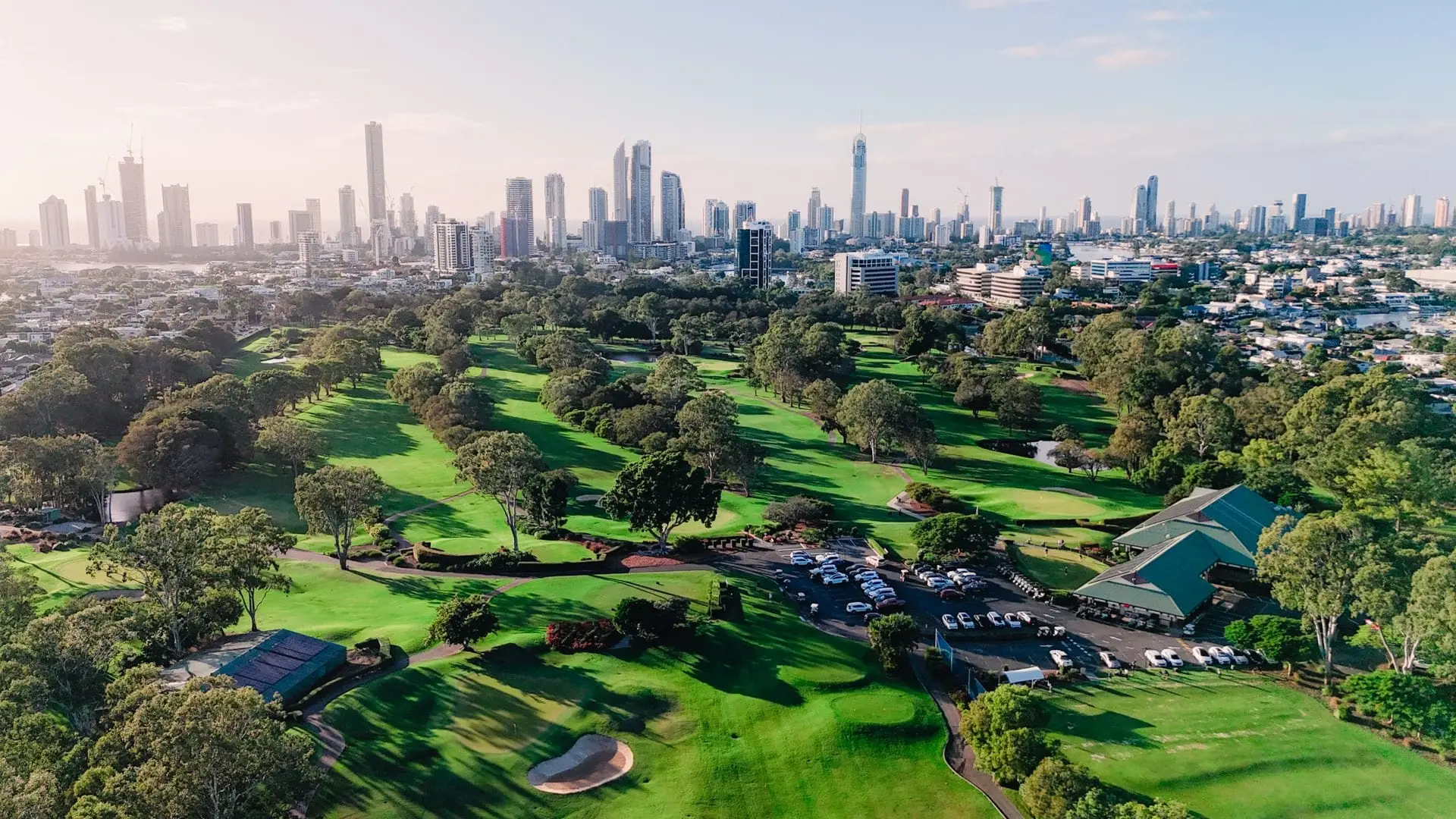 Aerial view of fairways with Gold Coast skyline behind