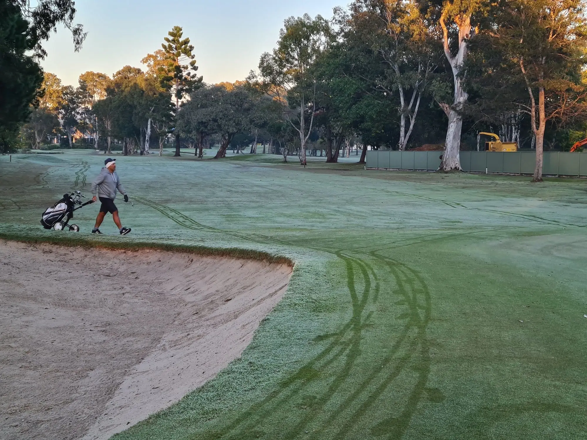 Bunker and fairway with frosty morning light