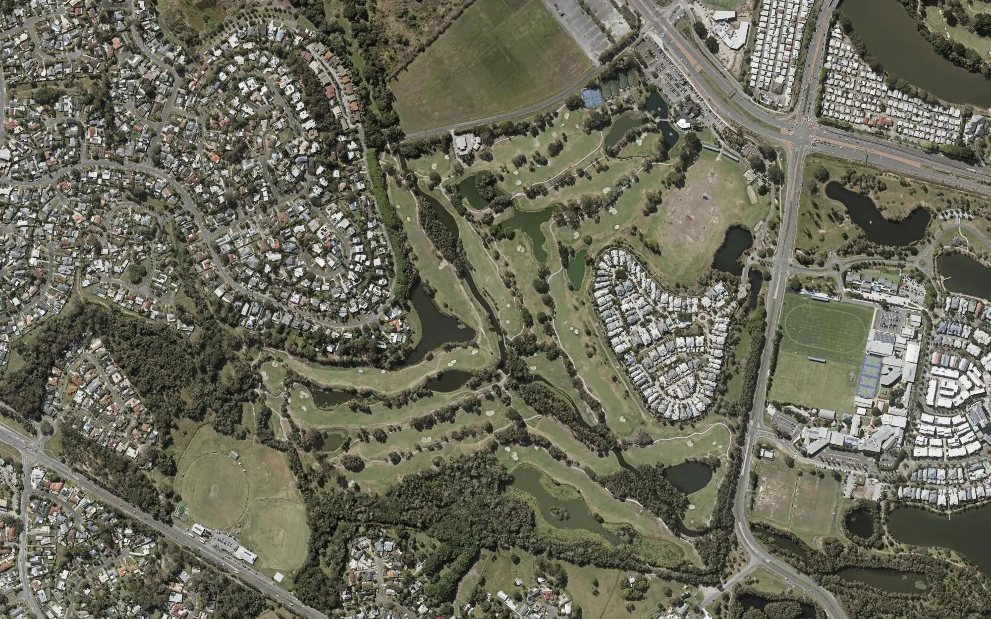 Aerial photo of Emerald Lakes Golf Club with holes numbered at each tee