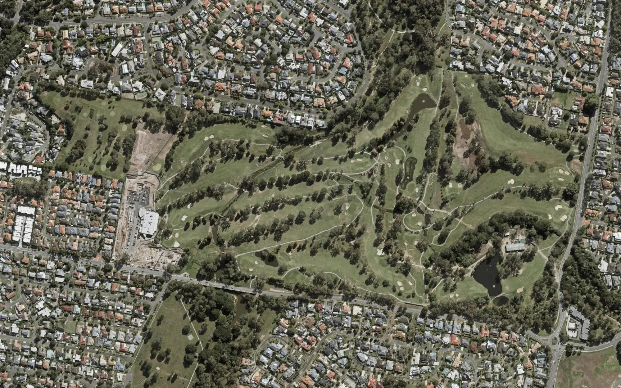 Aerial photo of Pacific Golf Club with holes numbered at each tee