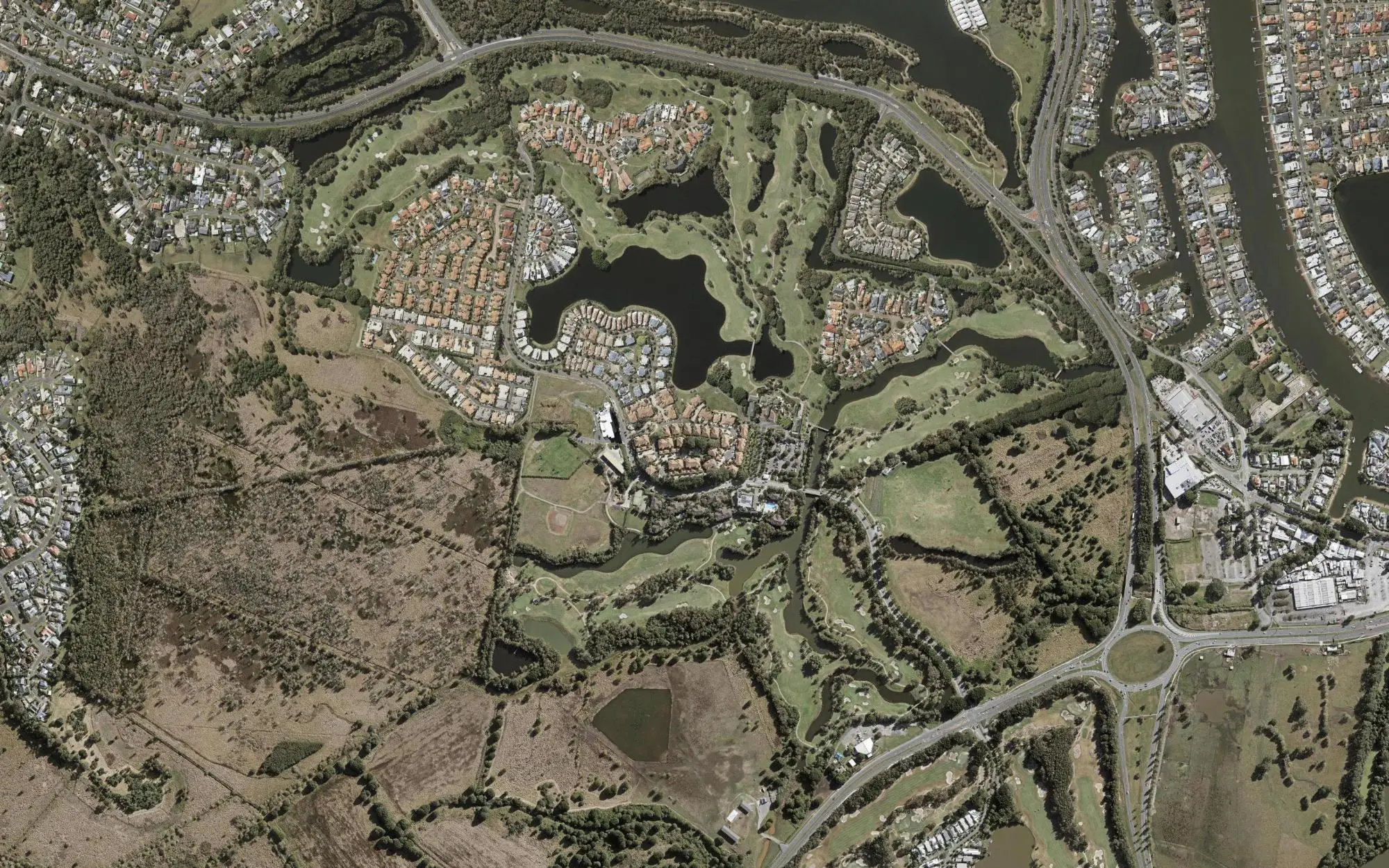 Aerial photo of Palm Meadows Golf Course with holes numbered at each tee