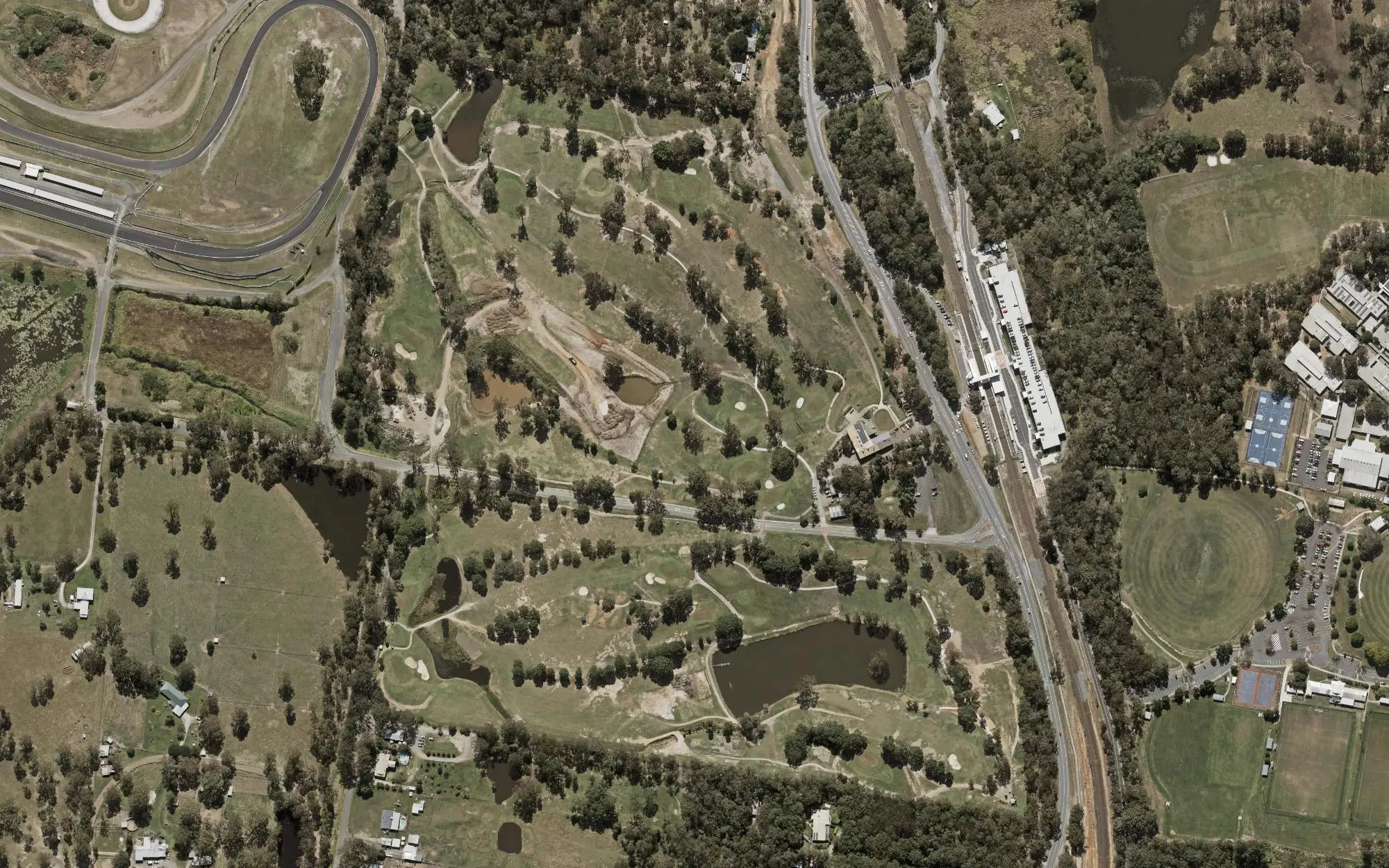 Aerial photo of Pine Rivers Golf Club with holes numbered at each tee