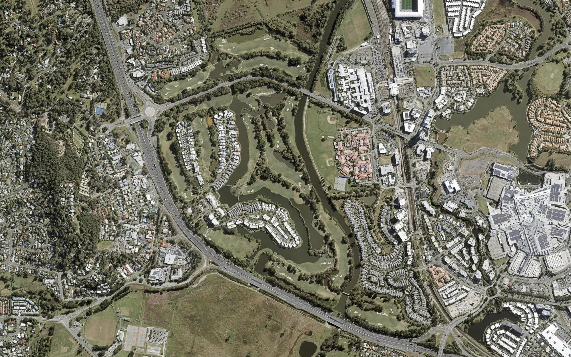 Aerial photo of The Glades Golf Club with holes numbered at each tee