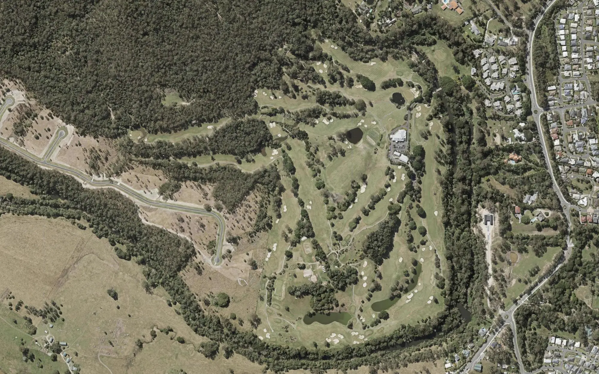Aerial photo of The Grand Golf Club with holes numbered at each tee